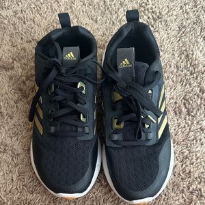 Adidas Black Sneakers with Gold Stripes